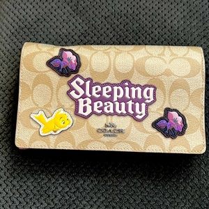 Coach X Disney sleeping Beauty clutch/crossbody